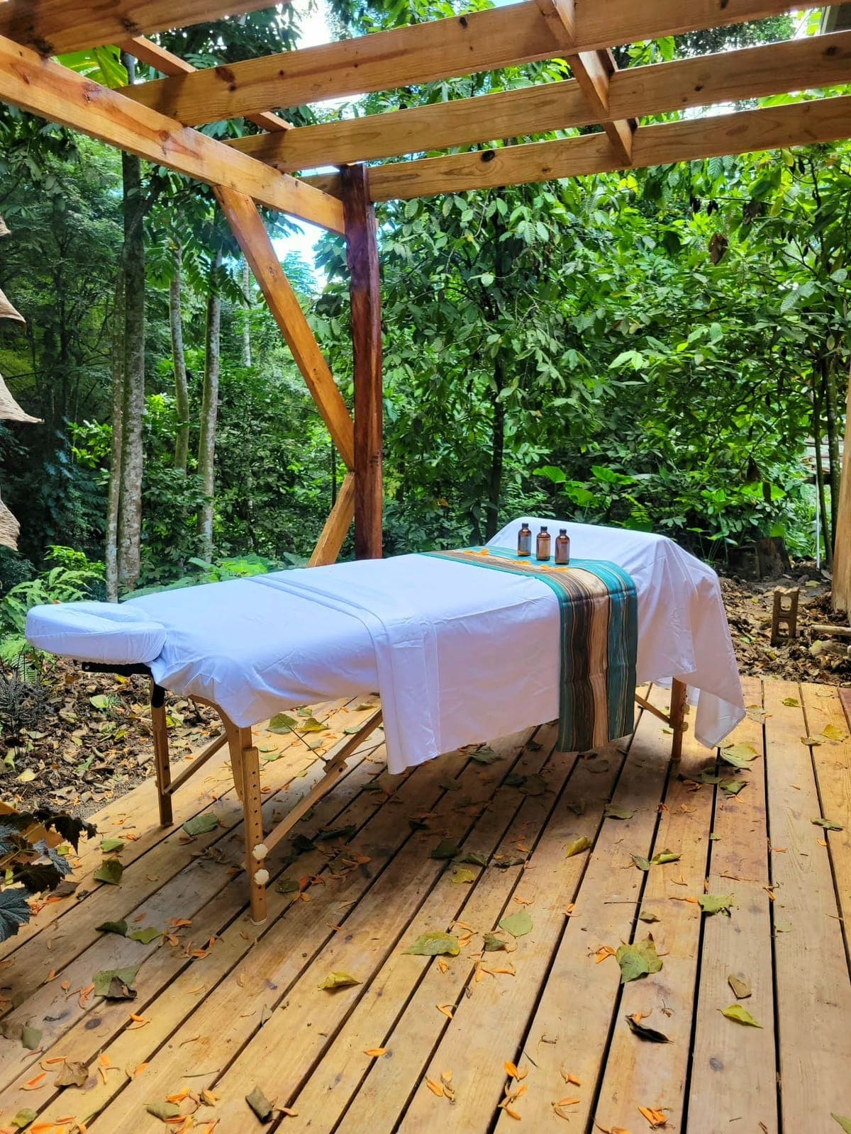 Outdoor massage table on a jungle deck