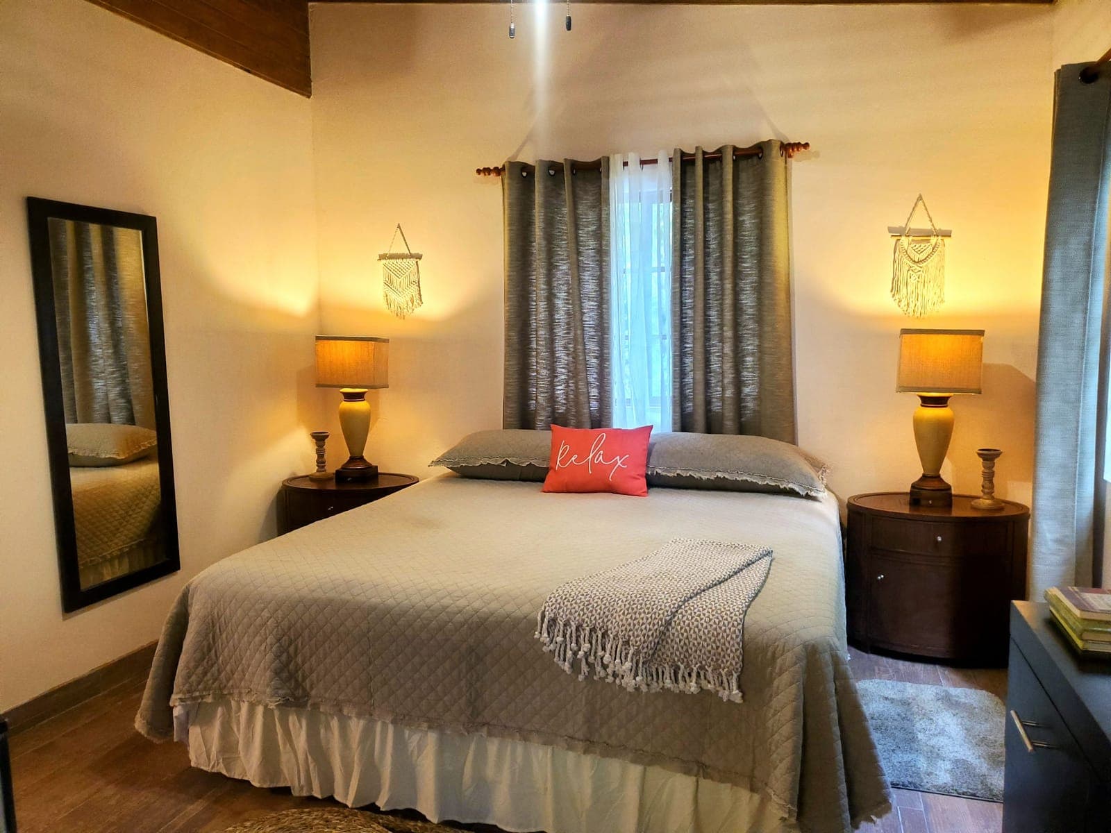 Tulia bedroom with a 'relax' cushion